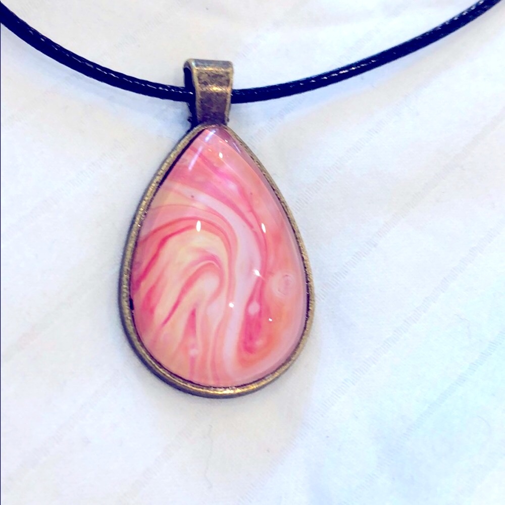 NWOT handmade  peach colour pendant